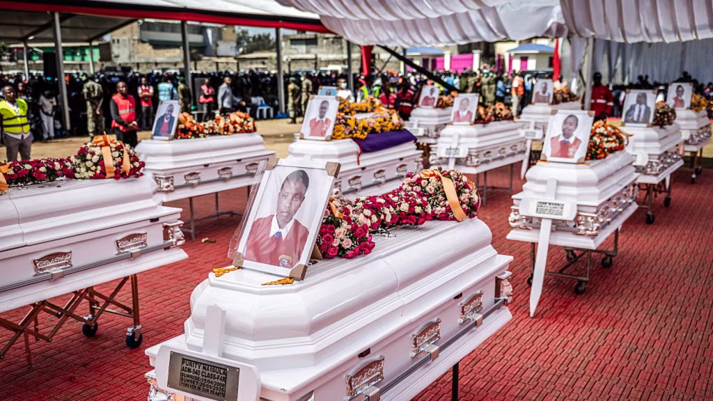 Mourners pray near coffins of victims of the Utumishi Girls’ Academy Senior School fire during a Mass in Gilgil on June 12, 2026, after a spate of school fires across Kenya. | Credit: Luis Tato/AFP via Getty Images /EWTN NEWS